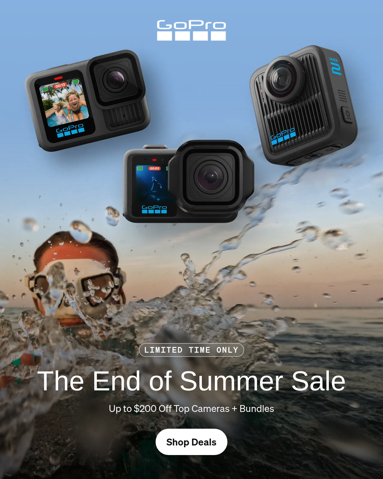 Three GoPro cameras floating above a person snorkeling in the ocean.